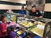 Officer-Serving-Lunch-at-Ikard-Elementaryw